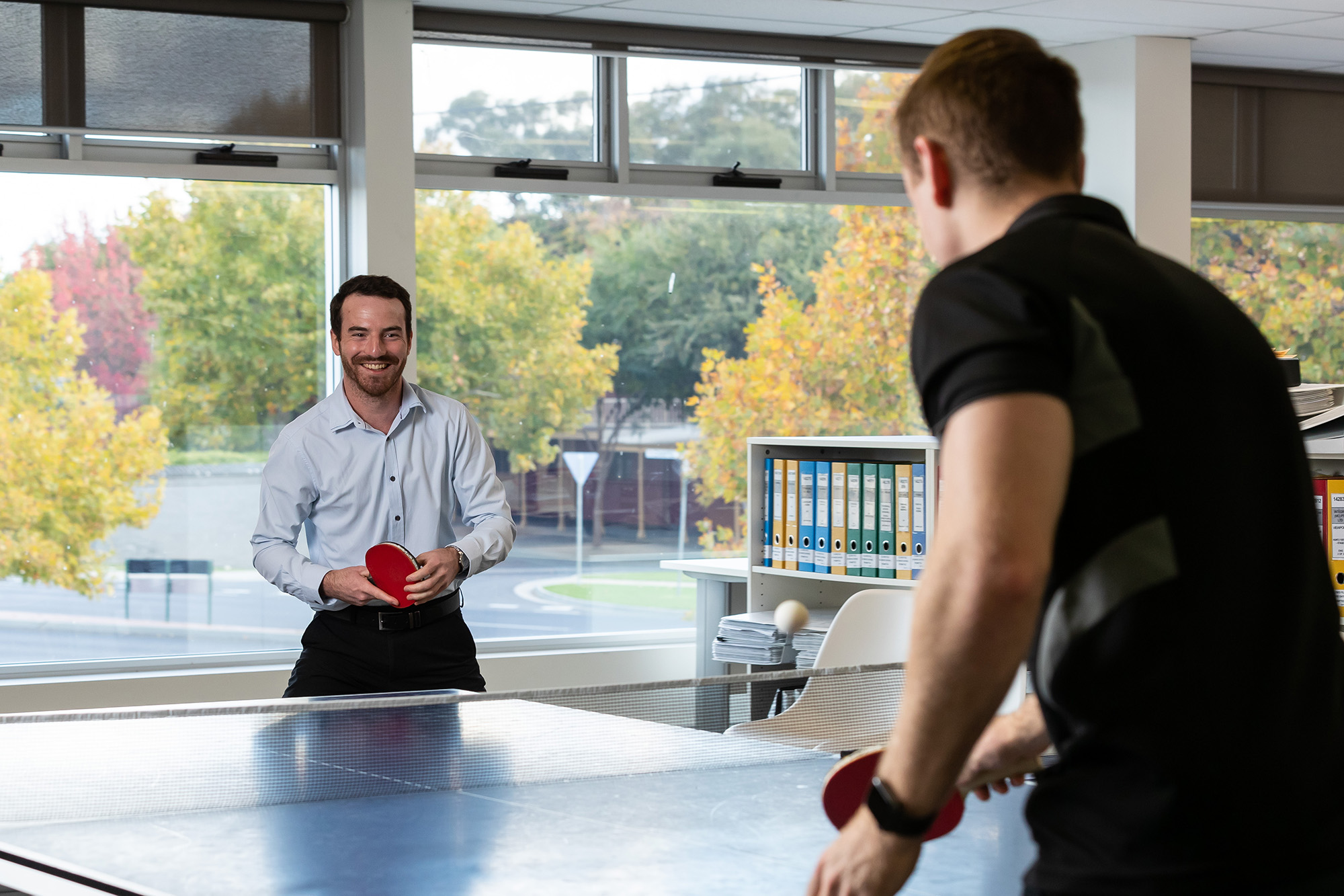 Consultants play table tennis at Spiire in Bendigo.
