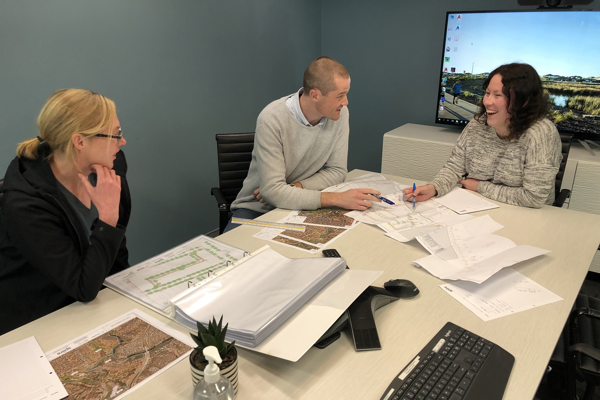 Consultants working together at Spiire's Canberra office.