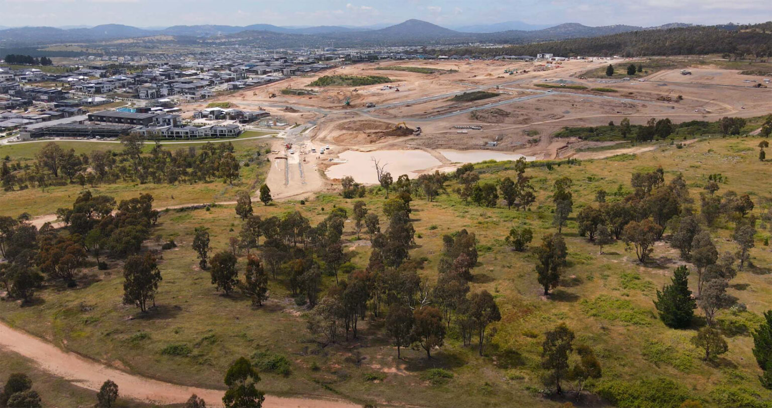 Aerial photography of civil construction works at Denman Prospect in Canberra.