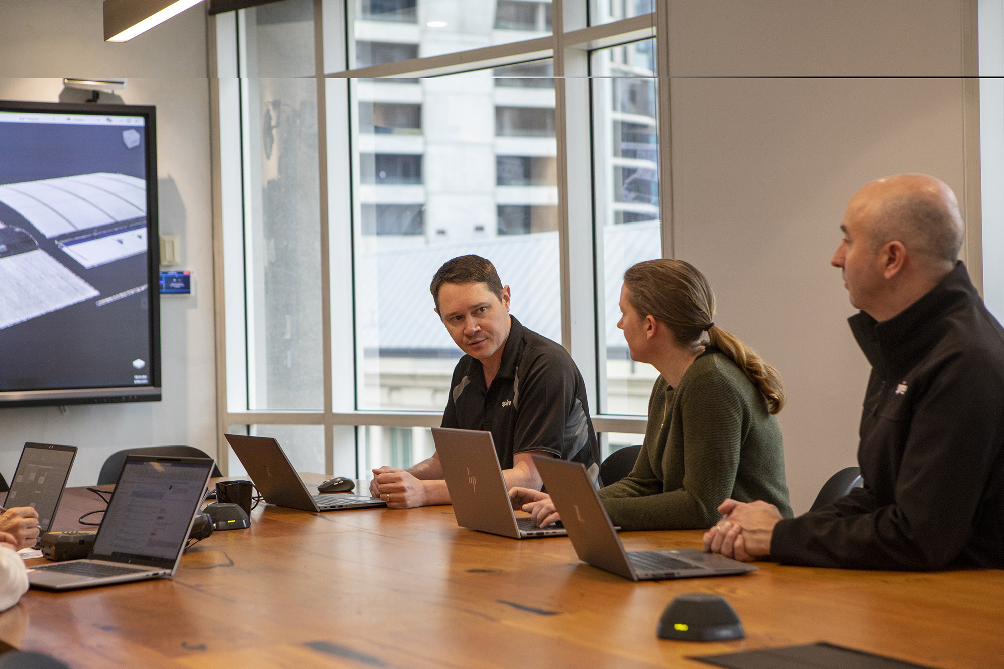 Surveyors Matt Trevaskis, Jessica Nauta and Brent O'Grady at Spiire's Melbourne office.