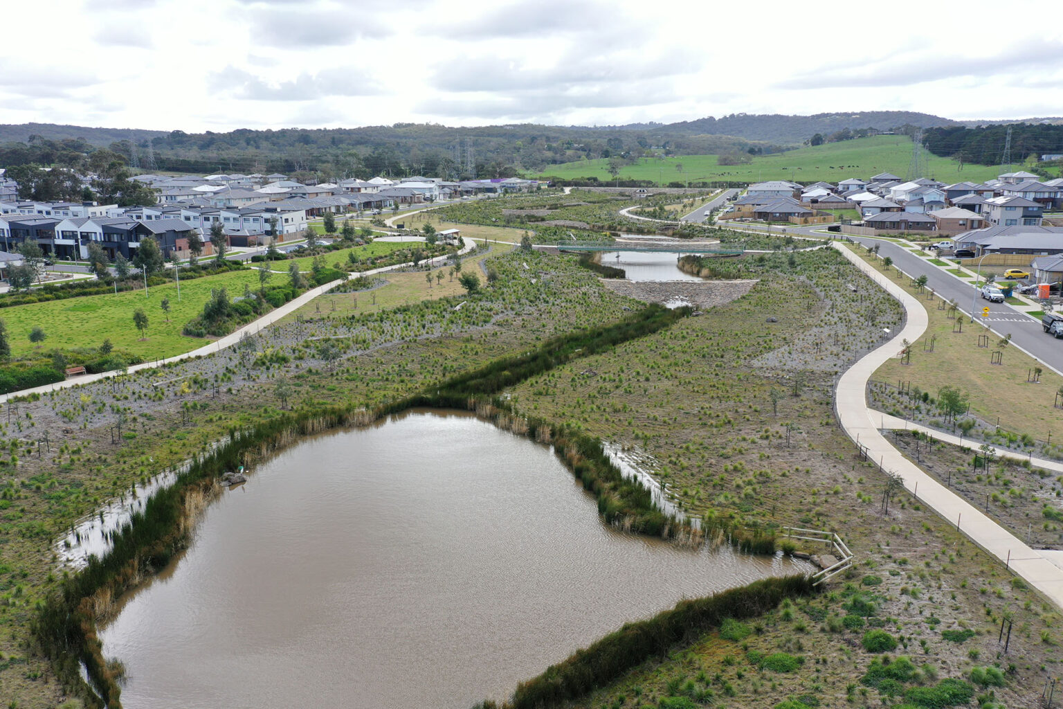 Aerial photograph of the Upper Gum Scrub Creek constructed waterway at Officer Fields, supplied by Habitat Creations.