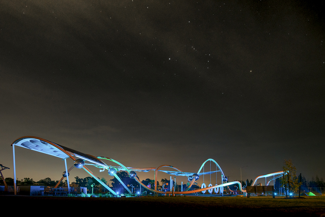 Entrance Park feature at Aurora Estate at night