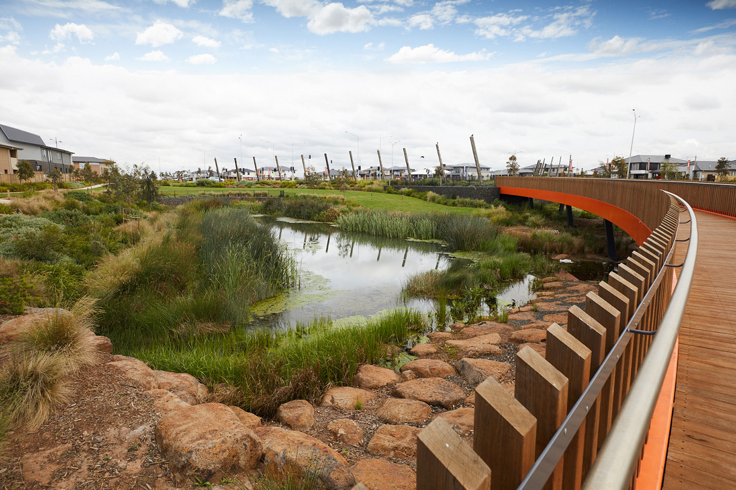 Raingarden and pedestrian bridge Woodlea estate designed by Spiire Water and Civil Engineering
