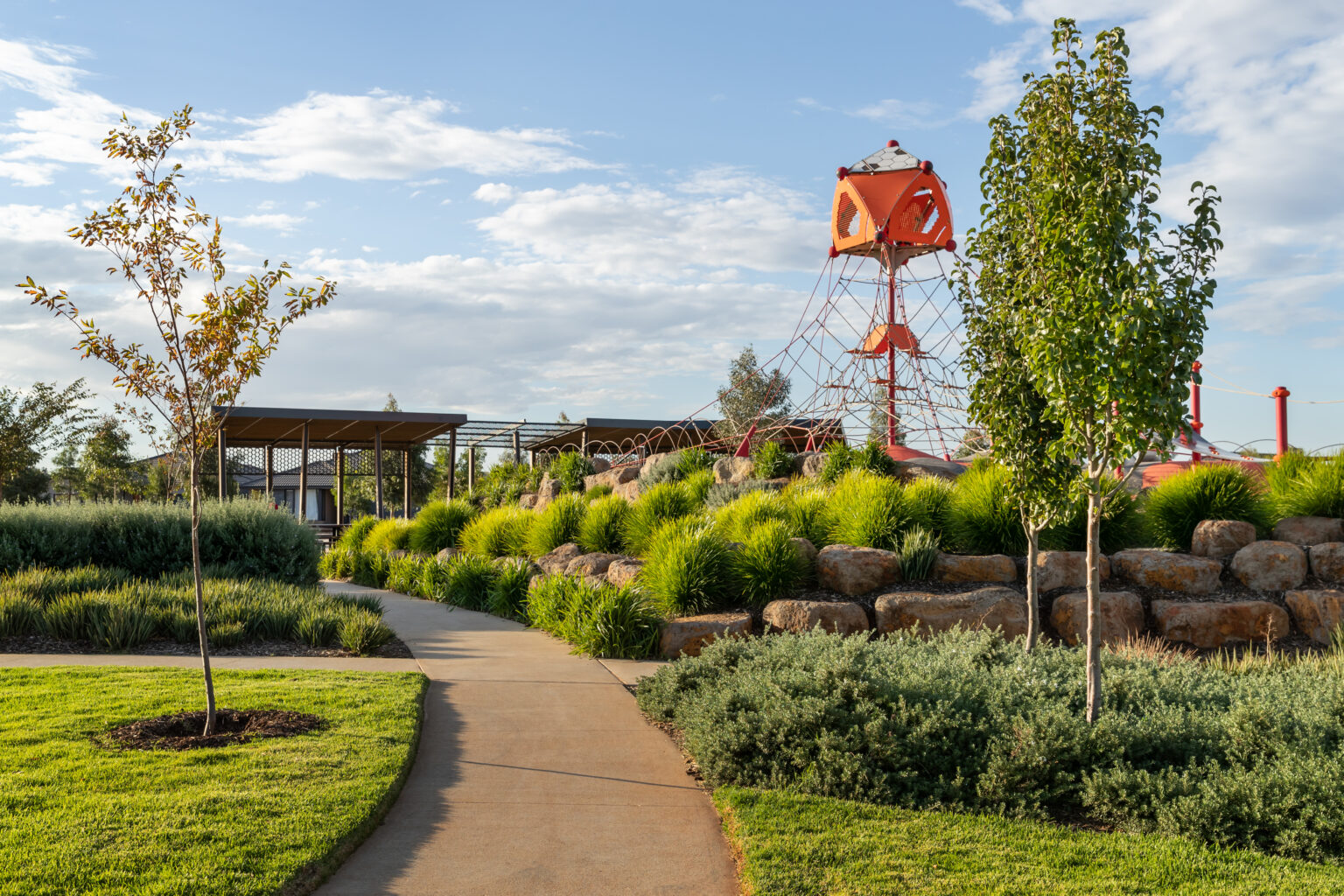 Play equipment and landscape architecture features at Thornhill Park residential estate in Melbourne.