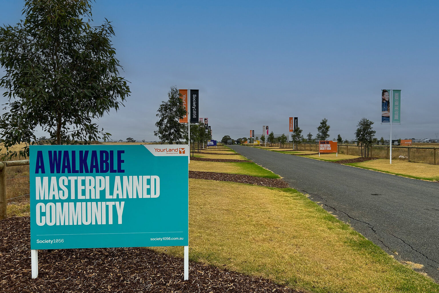 Entry signage at the Society 1056 development.
