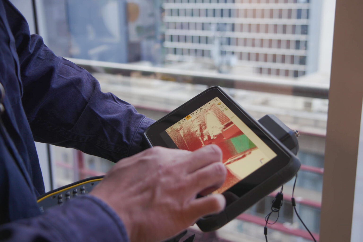 Surveyor using equipment at Spiire's Melbourne office.