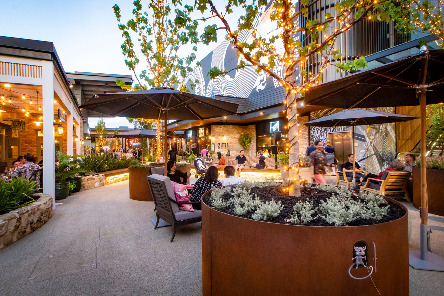 Outdoor dining precinct at Tea Tree Plaza designed by Spiire Landscape Architects